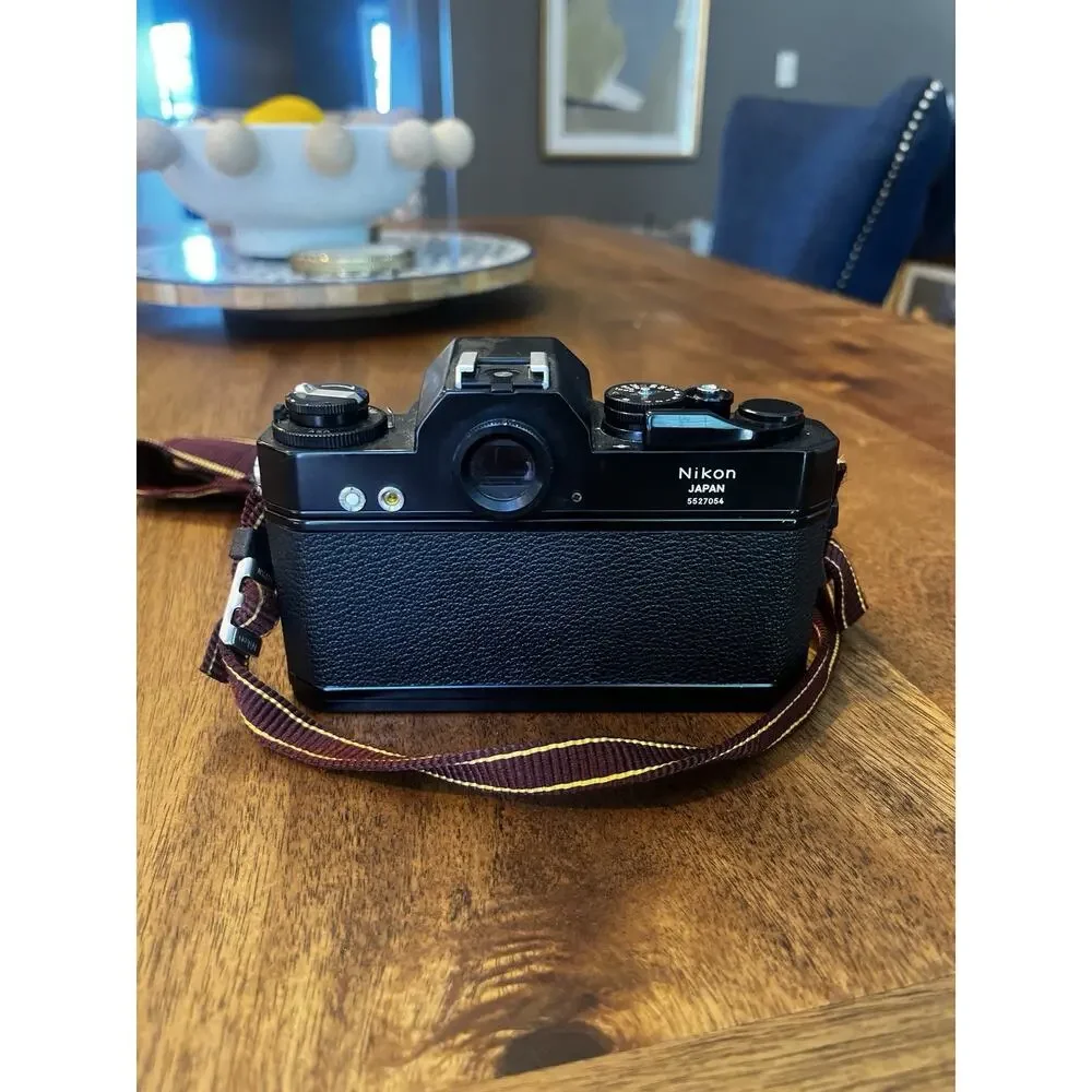Nikon Black Camera with Brown Strap